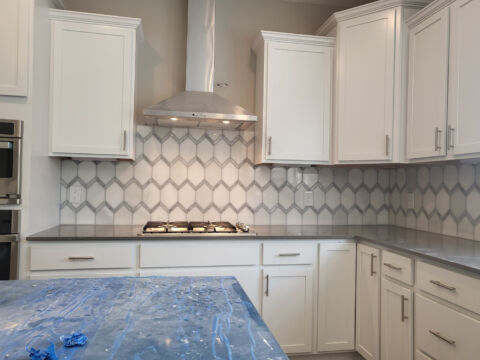 Hard Surface Interiors: Interior construction and remodeling with a specialization in tile and stone, we can transform your space with multiple types of flooring including tile, wood, and epoxy.