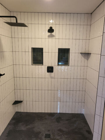 Hard Surface Interiors: Interior construction and remodeling with a specialization in tile and stone, we can transform your space with multiple types of flooring including tile, wood, and epoxy.