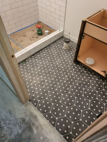 Hard Surface Interiors: Interior construction and remodeling with a specialization in tile and stone, we can transform your space with multiple types of flooring including tile, wood, and epoxy.