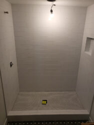 Hard Surface Interiors: Interior construction and remodeling with a specialization in tile and stone, we can transform your space with multiple types of flooring including tile, wood, and epoxy.