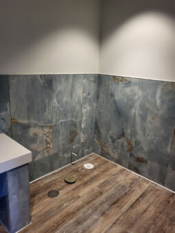 Hard Surface Interiors: Interior construction and remodeling with a specialization in tile and stone, we can transform your space with multiple types of flooring including tile, wood, and epoxy.